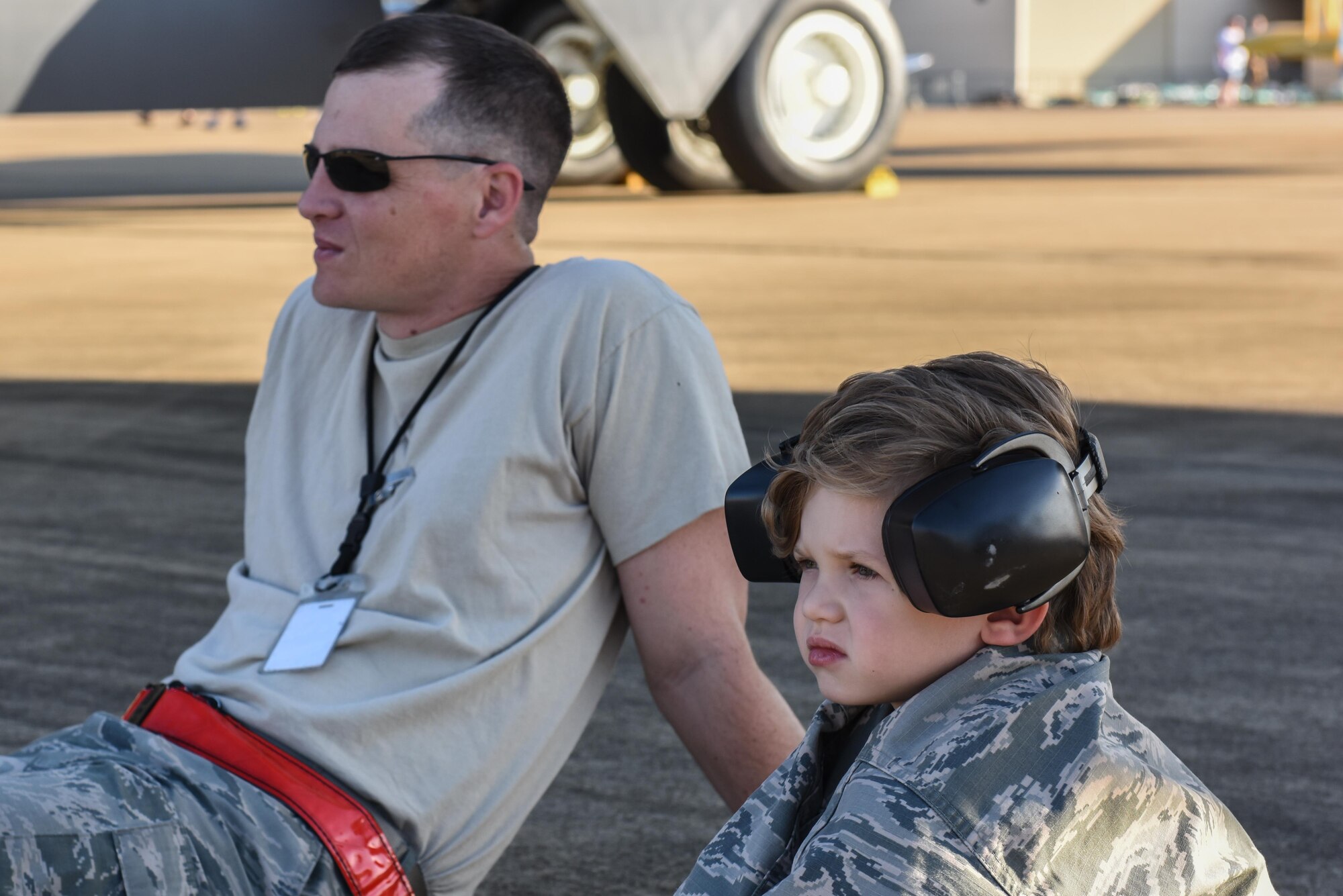 Spectators watch aerial demonstrations during the 2017 Defenders of Liberty Air Show at Barksdale Air Force Base, La., May 5, 2017. The 2017 Defenders of Liberty Air Show includes stunt planes, parachutists, static displays and entertainment for children. (U.S. Air Force photo/Senior Airman Luke Hill)