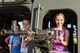 A girl poses for a photo on a helicopter display during the 2017 Defenders of Liberty Air Show at Barksdale Air Force Base, La., May 5, 2017. The show provided many exhibits for children in addition to the aircraft performances. (U.S. Air Force photo/Senior Airman Luke Hill)