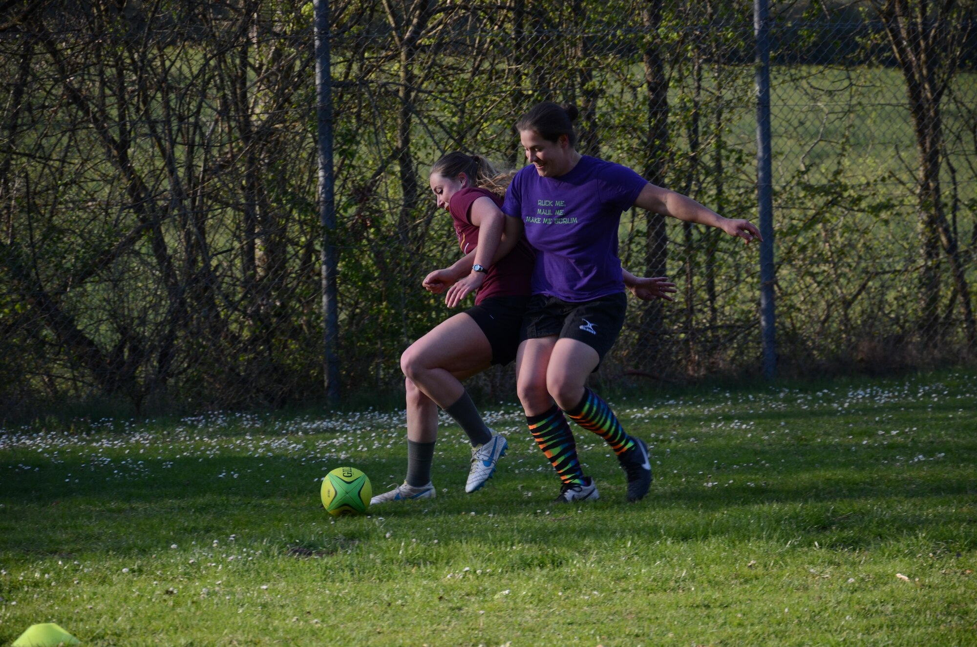 Two Kaiserslautern women’s rugby team members compete for the ball in Hochspeyer, Germany, April 18, 2017. Players can earn points by crossing the tryline with the ball and touching it to the ground. (U.S. Air Force photo/A1C Alexis C. Schultz)