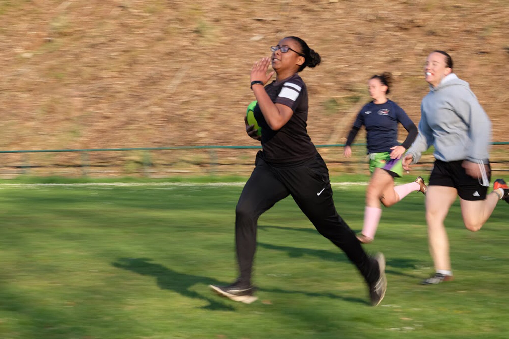 Kaiserslautern women’s rugby team members run after the ball during practice in Hochspeyer, Germany, April 18, 2017. Practices take place from 6 p.m. to 8 p.m. every Tuesday and Thursday. (U.S. Air Force photo/A1C Alexis C. Schultz)