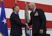 Brig. Gen. James F. Mackey, the Mobilization Assistant to the Director of Operations, Joint Base Langley-Eustis, Va., congratulates Brig. Gen. Brian Borgen, the 442d Fighter Wing Commander, during his promotion ceremony at Whiteman Air Force Base, Mo., May 6, 2017. Borgen met Mackey while he was a cadet at Kansas State University in the early 1990s. (U.S. Air Force photo by Senior Airman Missy Sterling)