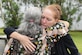 Patricia Gay, 734th Air Mobility Squadron, embraces a friend during Lt Col. (Ret.) Chuck McManus’ funeral at the Guam Veterans Cemetery April 26, 2017, in Piti, Guam. McManus was a key figure at Andersen Air Force Base due to his involvement during the Linebacker II campaign during the Vietnam War. (U.S. Air Force photo by Airman 1st Class Christopher Quail)