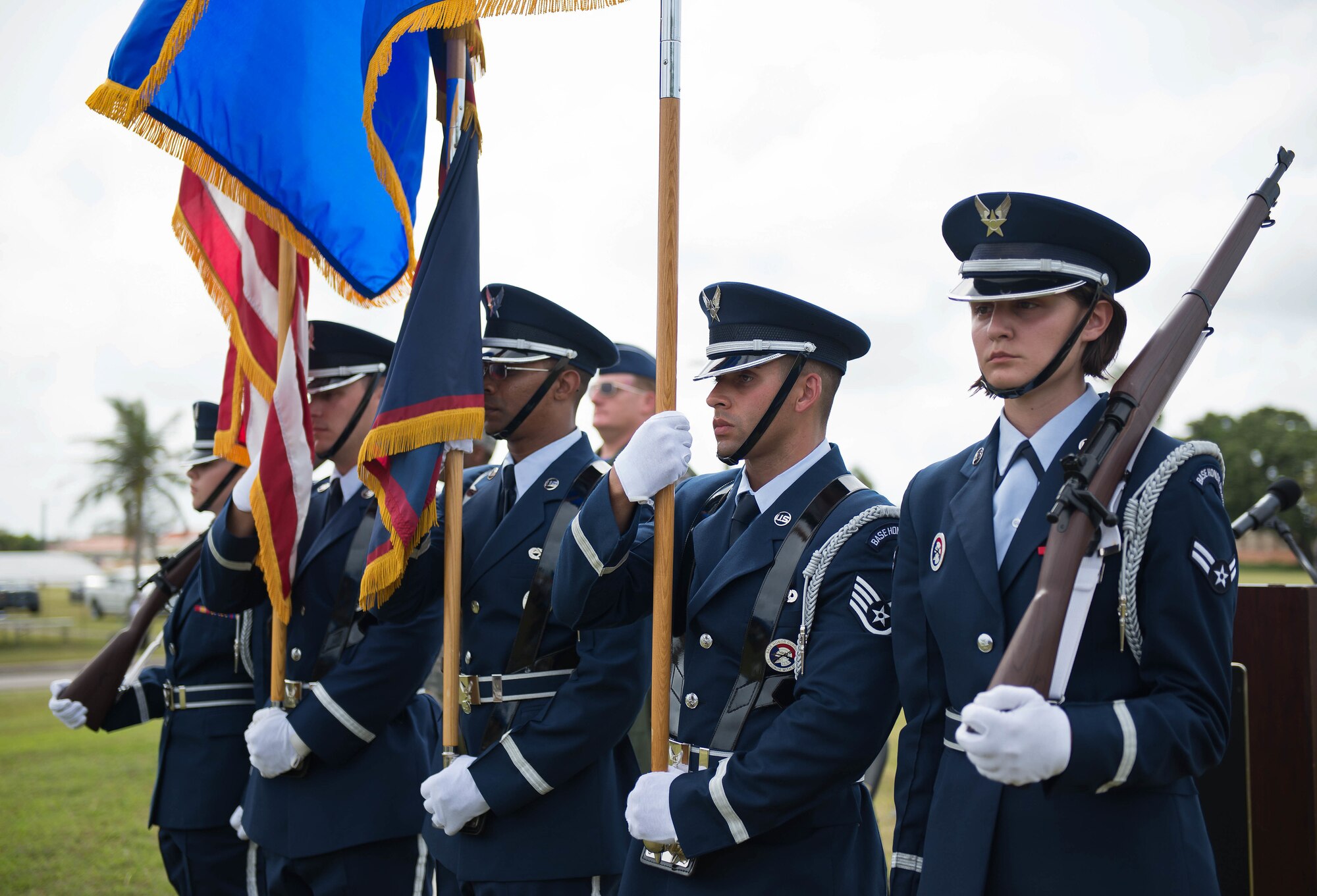 The Andersen Blue Knights Honor Guard team presents the colors during the F-4E Phantom II Rededication Ceremony, April 21, 2017, at Andersen Air Force Base, Guam. The Phantom II was first deployed to the Pacific Air Forces in December 1964, in support of the Vietnam War. (U.S. Air Force photo by Airman 1st Class Christopher Quail/Released)