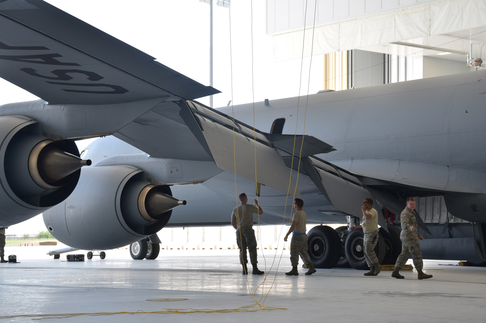 Airmen of the 931st Maintenance Squadron prepare to tow a KC-135 Stratotanker from Hangar 1107 during the May Unit Training Assembly May 7, 2017, McConnell Air Force Base, Kan.  Hangar 1125 will eventually be used for general maintenance on the KC-46A Pegasus when it is delivered to McConnell later this year.  (U.S. Air Force photo by Tech. Sgt. Abigail Klein)
