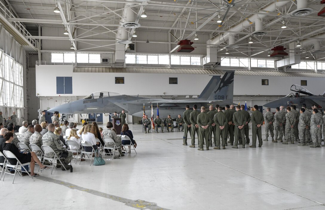 U.S Air Force Capt. Clayton Diltz, 144th Fighter Wing Base Chaplain, addresses friends, family and Airmen of the 144th Fighter Wing during an Assumption of Command and Change of Command ceremony held in the Fresno Air National Guard base hangar, May 7, 2017. (U.S. Air National Guard photo/Tech. Sgt. Charles Vaughn)