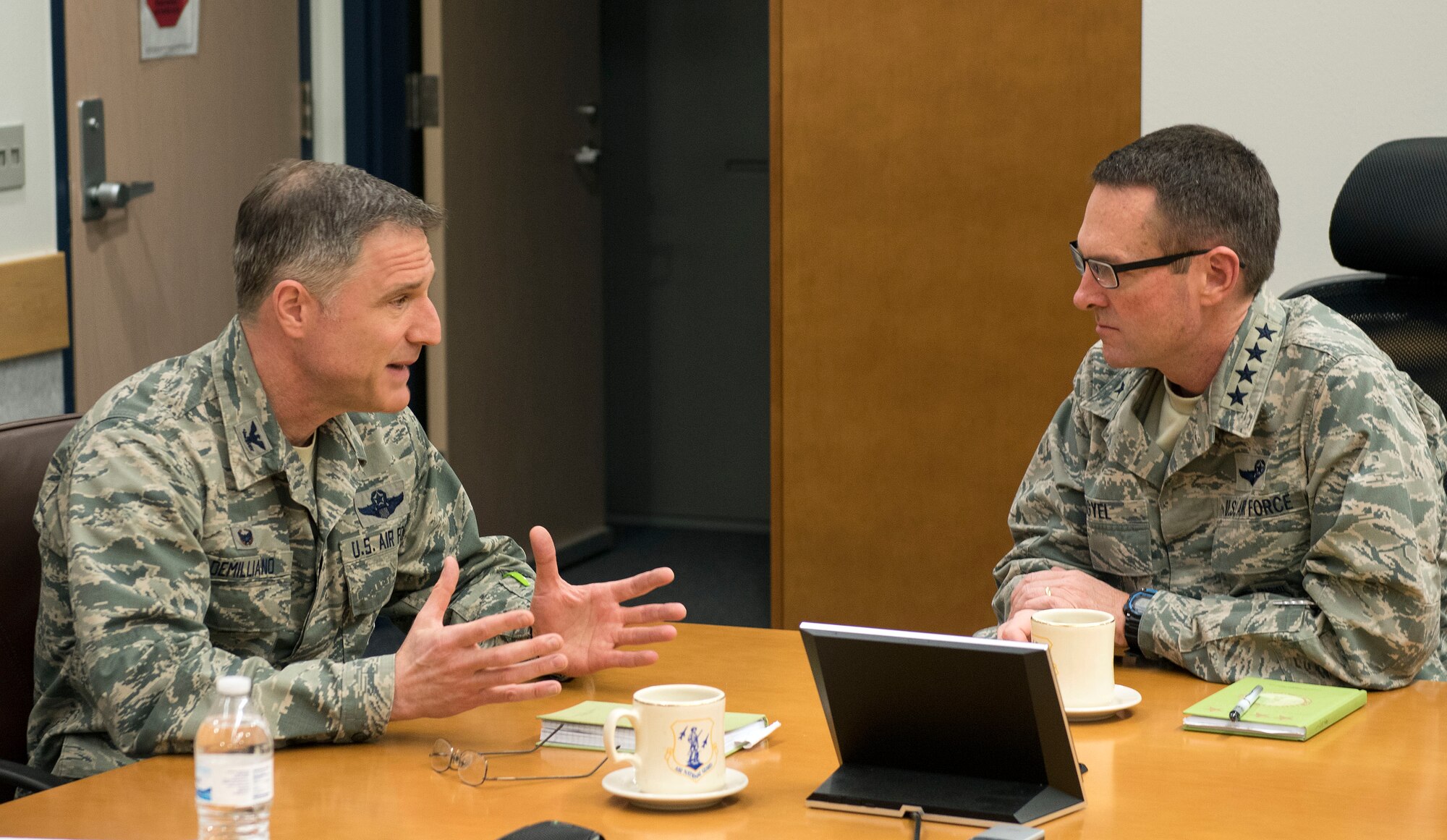 National Guard Bureau Chief Gen. Joseph L. Lengyel (right), the ranking officer in the U.S. National Guard, discusses Alaska Air National Guard capabilities with Col. Steven deMilliano, commander of the Alaska Air National Guard's 176th Wing, here May 7, 2017. Lengyel visited the wing as part of a wider tour of Alaska National Guard installations. While here, he met with the wing's senior leaders, toured maintenance facilities, and met and fielded questions from Airmen of all ranks.