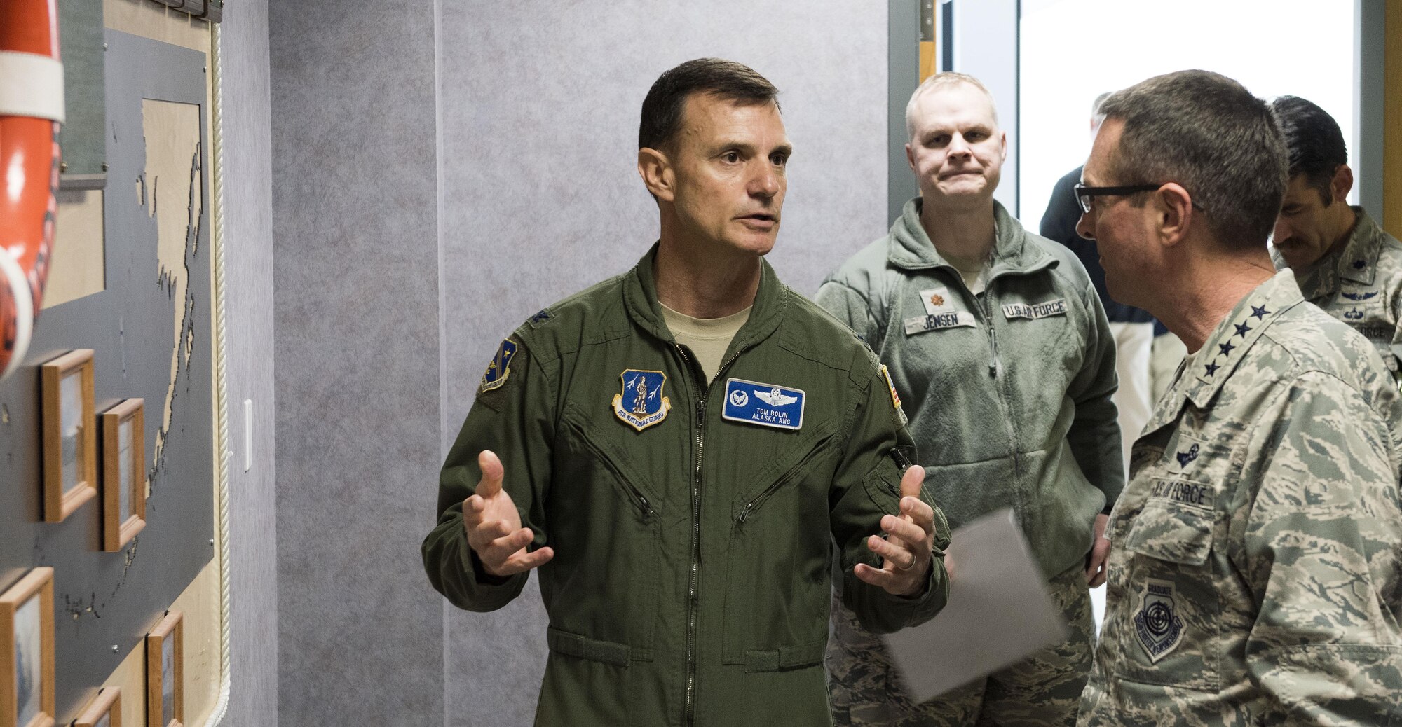 Gen. Joseph L. Lengyel (right) discusses the capabilities of the Alaska Air National Guard's 176th Operations Group with Col. Thomas Bolin, the group's commander, here May 7, 2017. Lengyel visited the 176th Wing as part of a wider tour of Alaska National Guard installations. While here, he met with the wing's senior leaders, toured maintenance facilities, and met and fielded questions from Airmen of all ranks.