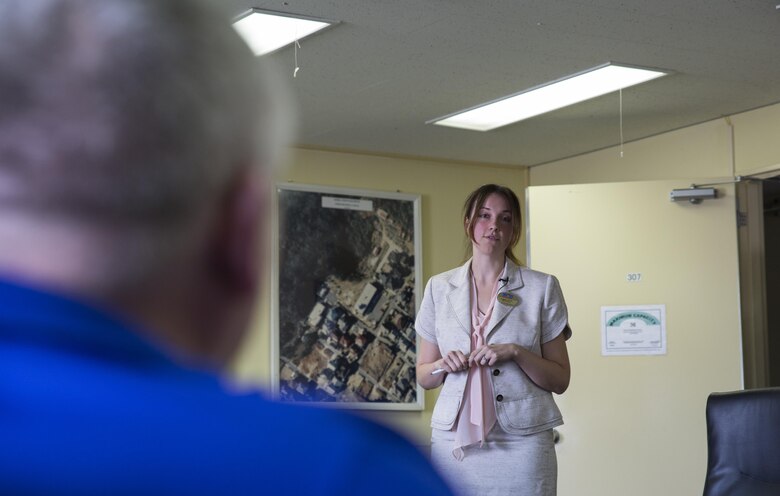 Angela Garrits, a Marine Corps Family Team Building life skills and readiness and deployment trainer, briefs service members, Department of Defense employees and civilians to inform them on the importance of Noncombatant Evacuation Operations (NEO) at 10th Regional Support Group Ammunition Depot in Kure City, Japan, May 3, 2017. A NEO takes place in the event of natural disasters, industrial accidents and military threats. Reaching out to other military installations provides the opportunity for a smooth operation and increases readiness in the area in case a real NEO occurs. (U.S. Marine Corps photo by Lance Cpl. Mason Roy)