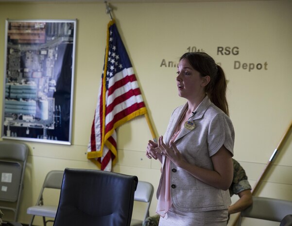 Angela Garrits, a Marine Corps Family Team Building life skills and readiness and deployment trainer, briefs service members, Department of Defense employees and civilians to inform them on the importance of Noncombatant Evacuation Operations (NEO) at 10th Regional Support Group Ammunition Depot in Kure City, Japan, May 3, 2017. A NEO takes place in the event of natural disasters, industrial accidents and military threats. Reaching out to other military installations provides the opportunity for a smooth operation and increases readiness in the area in case a real NEO occurs. (U.S. Marine Corps photo by Lance Cpl. Mason Roy)