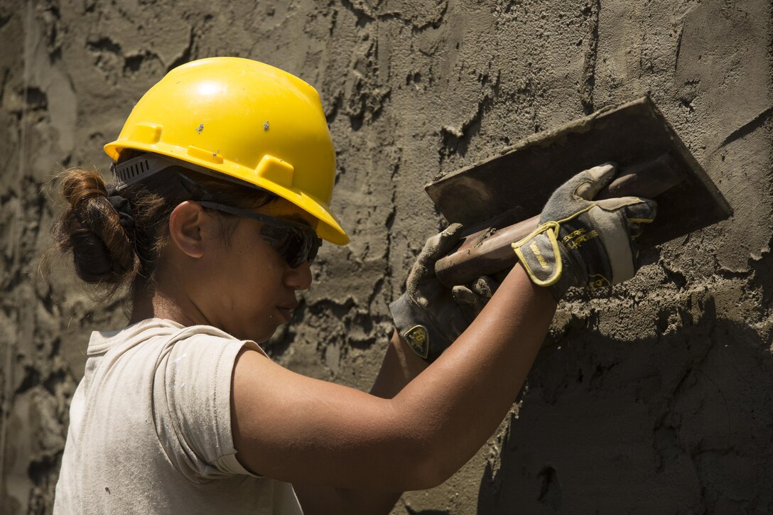U.S. Army Sgt. Kilohana Abilay applies plaster to a school building at Duran Elementary School in Dumalag, Capiz, April 29, 2017 as part of a humanitarian civic action project for Balikatan 2017. Abilay is an interior electrician with 230th Engineer Company, Hawaii Army National Guard. Balikatan is an annual U.S.-Philippine bilateral military exercise focused on a variety of missions, including humanitarian assistance and disaster relief, counterterrorism, and other combined military operations.  