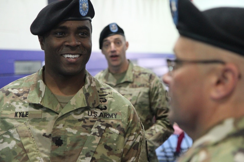 Army Lt. Col. Clifton C. Kyle, commander of the 457th Civil Affairs Battalion , 361st CA Brigade, 7th Mission Support Command, talks to Soldiers of his new unit after a change of command ceremony held at the Field House, Tower Barracks, United States Army Garrison, Bavaria on May 7, 2017. 