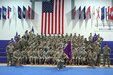 Soldiers of the 457th Civil Affairs Battalion , 361st CA Brigade, 7th Mission Support Command pose for a group photo to welcome Lt. Col. Clifton C. Kyle, the incoming commander,  after a change of command ceremony held at the Field House, Tower Barracks, United States Army Garrison, Bavaria on May 7, 2017. 