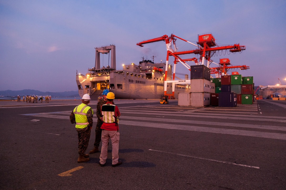 U.S. Marines talk with a port official during Balikatan 2017 in Subic Bay, Zambales, April 30, 2017. Balikatan is an annual U.S.-Philippine bilateral military exercise focused on a variety of missions, including humanitarian assistance and disaster relief, counterterrorism and other combined military operations. 