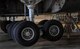 Staff Sgt. Cesar Mardirossian, 60th Aircraft Maintenance Squadron flying crew chief, inspects the landing gear of a C-5M Galaxy on Ramstein Air Base, Germany, May 3, 2017. When landing at Ramstein, the number four main landing gear of the aircraft did not lower until the crew used the emergency backup system and were able to make a safe landing. Airmen assigned to the 721st AMXS and 60th AMXS raised the aircraft on six fuselage jacks to inspect and repair the landing gear. (U.S. Air Force Senior Airman Tryphena Mayhugh)