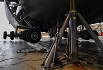 The landing gear of a C-5M Galaxy raised on six fuselage jacks lowers during a function check on Ramstein Air Base, Germany, May 3, 2017. During landing at Ramstein, the aircraft’s number four main landing gear did not lower. The crew was still able to make a safe landing, and the aircraft was towed, jacked, inspected, and repaired by Airmen assigned to the 721st Aircraft Maintenance Squadron and 60th AMXS. (U.S. Air Force Senior Airman Tryphena Mayhugh)