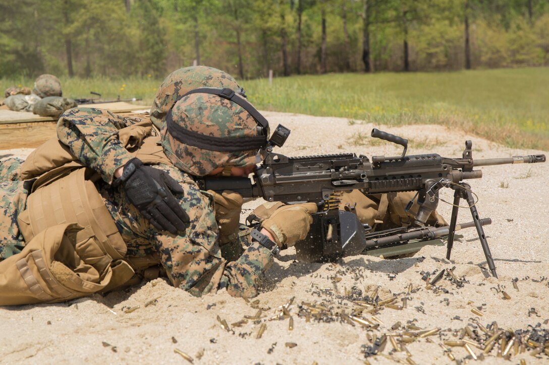A Marine fires an M249 light machine gun during a machine gun course at Fort A.P. Hill, Va., April 28, 2017. Marines conducted the training in preparation for an upcoming deployment and to maintain combat readiness. The Marines are with 2nd Battalion, 2nd Marine Regiment. (U.S. Marine Corps photo by Pfc. Abrey D. Liggins)