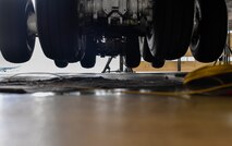 The tires of a C-5M Galaxy’s main landing gear hang several inches off the ground as the aircraft rests on six fuselage jacks on Ramstein Air Base, Germany, May 3, 2017. Each jack can hold up to 60 tons, equaling 720,000 pounds, and a typical C-5 weighs 415,000 pounds. The aircraft was jacked to inspect and repair the number four main landing gear. (U.S. Air Force Senior Airman Tryphena Mayhugh)