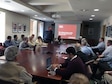 Oriana Skylar Mastro (center, seated at far end of table) gives a presentation on her research work, which delves into how the U.S. and China would handle North Korea&#39;s nuclear assets in the event of a contingency. Captain Mastro is an Air Force Reserve Individual Mobilization Augmentee assigned to Pacific Air Force as a political-military affairs strategist. She is also a Stanton Nuclear Security Fellow at the Council on Foreign Relation and assistant professor of security studies at Georgetown University in Washington, D.C.