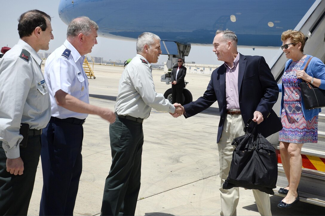 Marine Corps Gen. Joe Dunford, chairman of the Joint Chiefs of Staff, shakes hands with Lt. Gen. Gadi Eizenkot, commander in chief of the Israeli Defense Force, after arriving in Israel, May 8, 2017. Dunford is scheduled to meet with Israeli Prime Minister Benjamin Netanyahu, Defense Minister Avigdor Lieberman and Israeli commanders, including Eizenkot. Photo by David Azagury