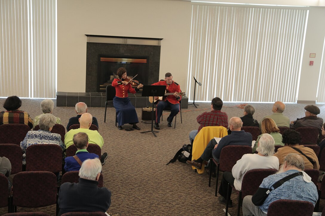On May 7, 2017 the Marine Band performed a concert called "Arioso" which highlighted music inspired by the connection between the human voice and instruments. Featured selections included Joseph Schwantner's and the mountains rising nowhere and James Stephenson's Symphony No. 2, Voices. A guitar/violin duo gave a pre-concert performance in the lobby. (U.S. Marine Corps photo by Master Sgt. Kristin duBois/released)