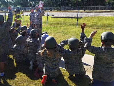Joint Base San Antonio-Randolph’s Military and Family Readiness Center staff members, and members of the 502nd Civil Engineer Squadron fire department, introduce third-, fourth- and fifth-grade students to the deployment process as part of Operation FLAGS May 5, 2017 on the Randolph Elementary School campus at JBSA-Randolph, Texas. Operation FLAGS, which stands for Families Learning About Global Support, is a means of educating families about what their loved ones go through when they deploy.