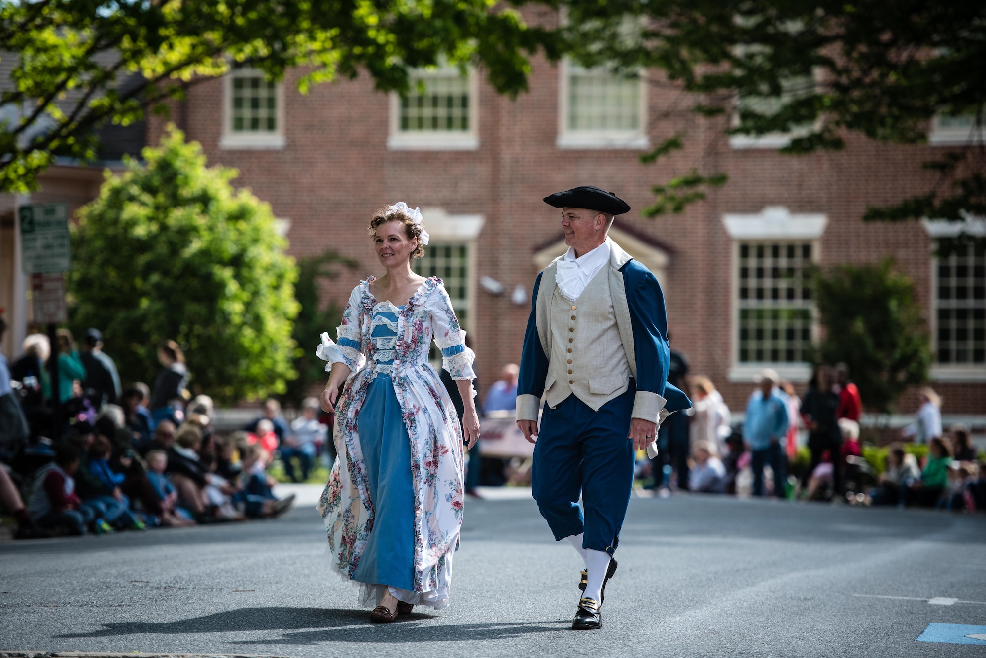 Col. Ethan Griffin, 436th Airlift Wing commander, and his wife, Erin, and Col. D. Scott Durham, 512th Airlift Wing commander, and his wife Jennifer, help lead the Old Dover Days parade May 6, 2017, in downtown Dover, Delaware. Old Dover Days is a celebration of Delaware’s history as the first state. (U.S. Air Force photo/1 Lt. Steve Lewis)