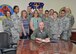 Col. Ron Allen, 341st Missile Wing commander, center, poses with Airmen from the 341st Medical Group after signing a proclamation celebrating the accomplishments and efforts of medical technicians and nursing services personnel throughout the year and during National Nurse/Technician Week. The appreciation week runs May 6-12 and is devoted to highlighting the diverse ways in which nursing personnel, the largest healthcare profession, are working to improve healthcare.  (U.S. Air Force photo/John Turner)