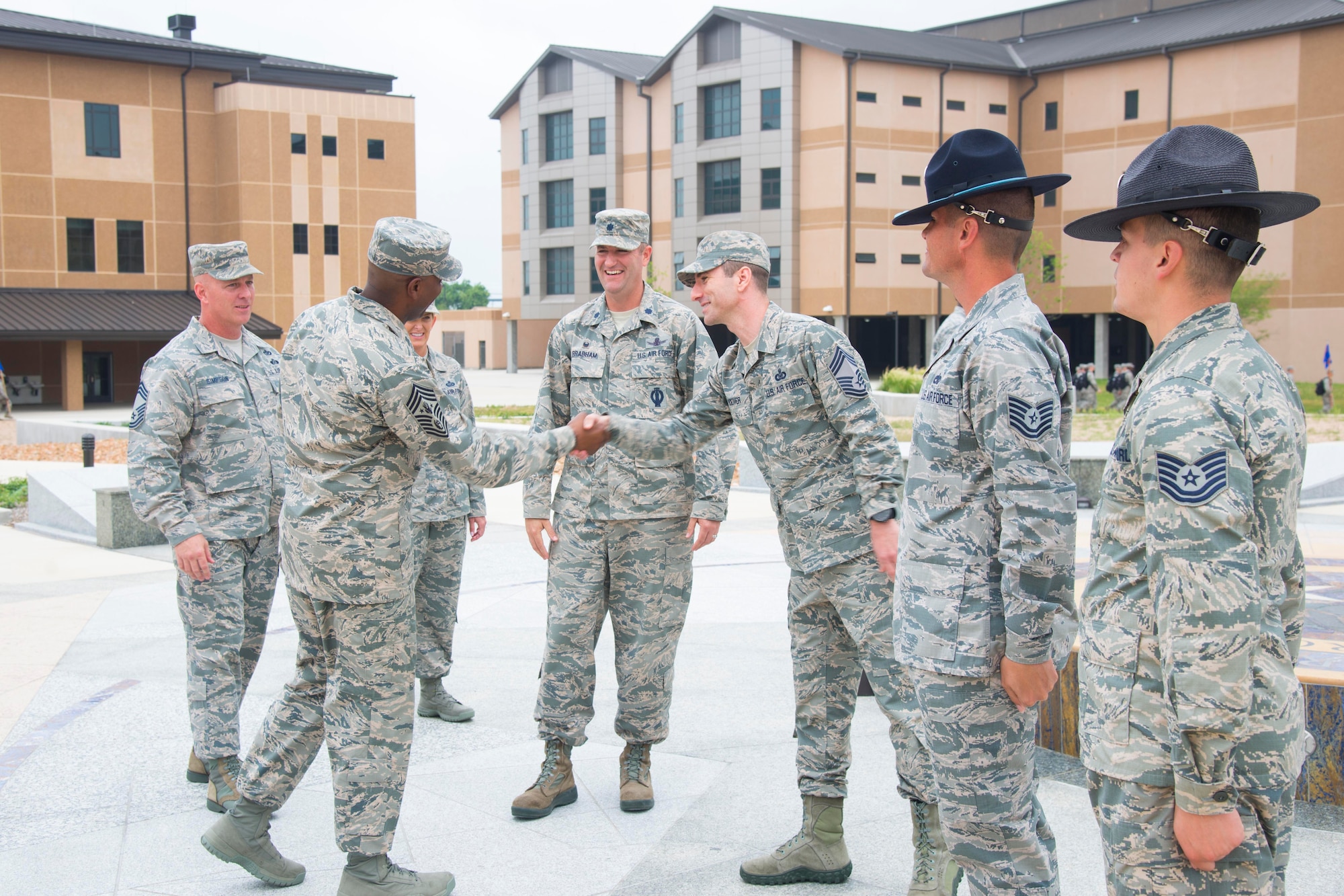 Chief Master Sgt. of the Air Force Kaleth O. Wright meets with senior leaders and
military training instructors from the 320th Training Squadron while visiting the
37th Training Wing May 3, 2017, at the Airman Training Complex campus at Joint
Base San Antonio-Lackland. The CMSAF visited JBSA-Lackland on his initial
immersion tour of Air Force Basic Military Training and Airmen’s Week, a week-long
discussion-based course designed to help new Airmen internalize the Air Force core
values while developing professionalism, resiliency and an Airmen’s corps inspired
by heritage and motivated to deliver Air Power for America. (U.S. Air Force photo by Airman Dillon Parker)