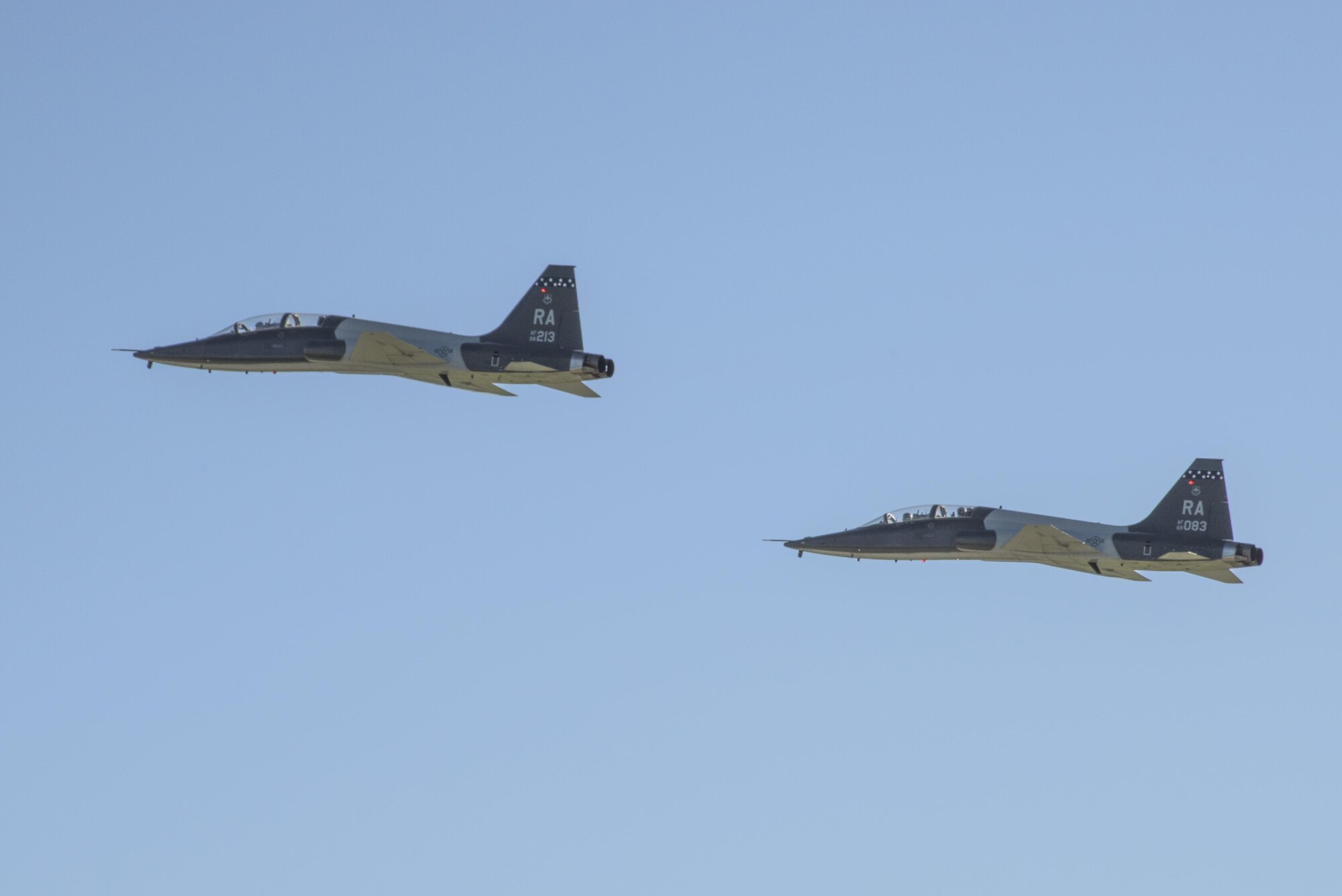 T-38 C Talons piloted by members of the 39th Flying Training Squadron take off from Joint Base San Antonio-Randolph, Texas May 4, 2017 during the Cobras in the Clouds exercise. The exercise gave 39th FTS members a chance to practice their war-time mission of taking control of the training mission of the 12th Operations Group. (U.S. Air Force photo by Senior Airman Stormy Archer)
