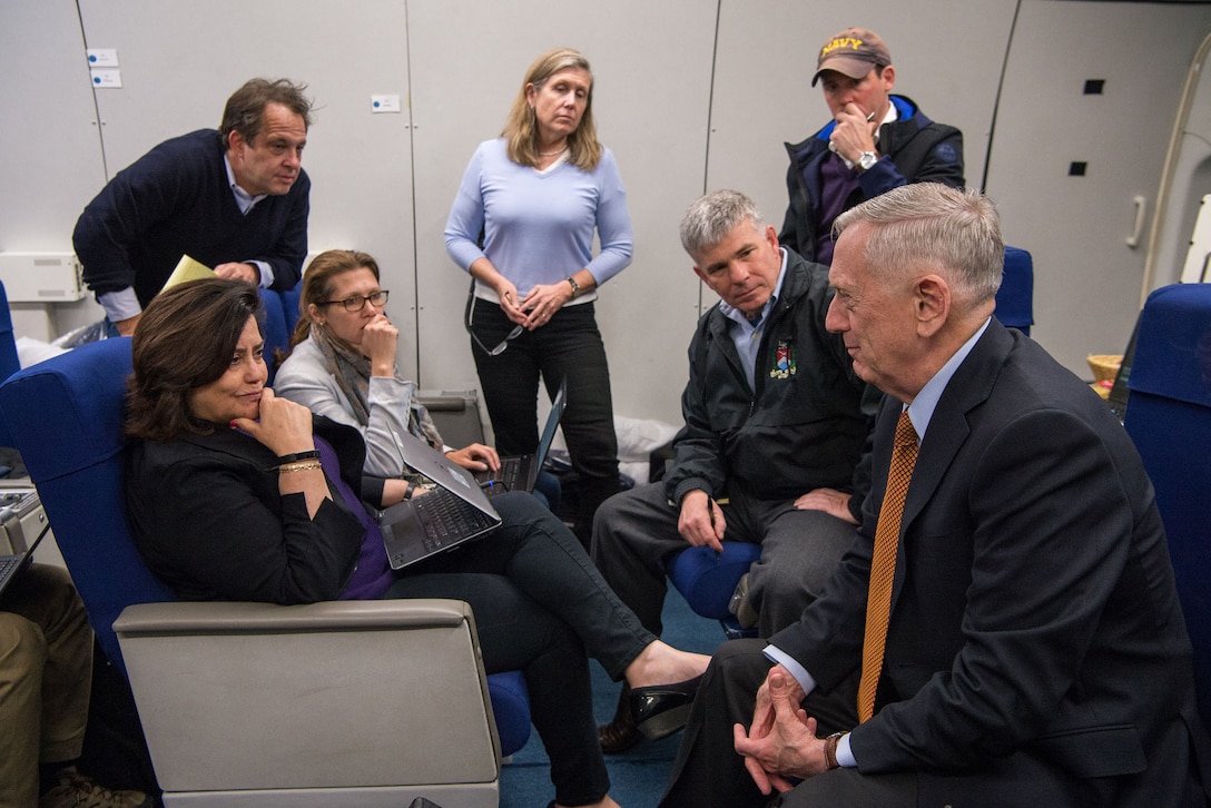 >Defense Secretary Jim Mattis speaks with reporters while flying to Copenhagen, Denmark