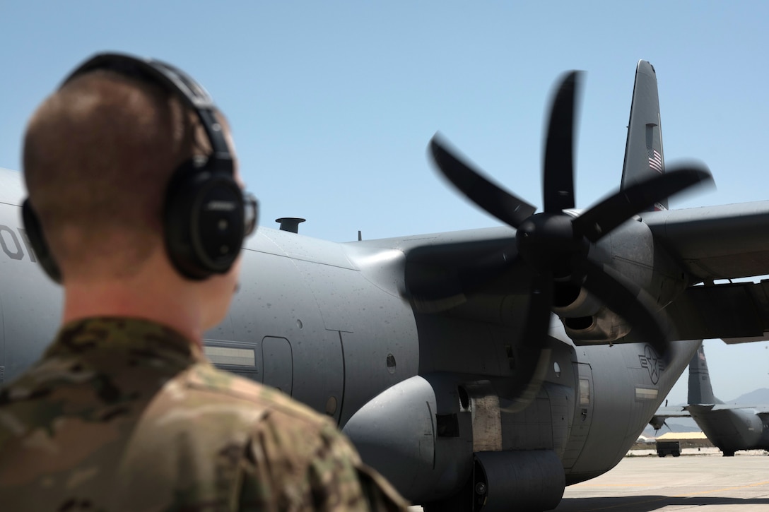 Air Force Senior Airman Brandon King inspects the propellers of a C-130J Super Hercules aircraft at Bagram Airfield, Afghanistan, May 5, 2017. King is a loadmaster assigned to the 774th Expeditionary Airlift Squadron, which provides tactical airlift capabilities that often involves non-standard or oversized cargo and personnel movement. Air Force photo by Staff Sgt. Benjamin Gonsier