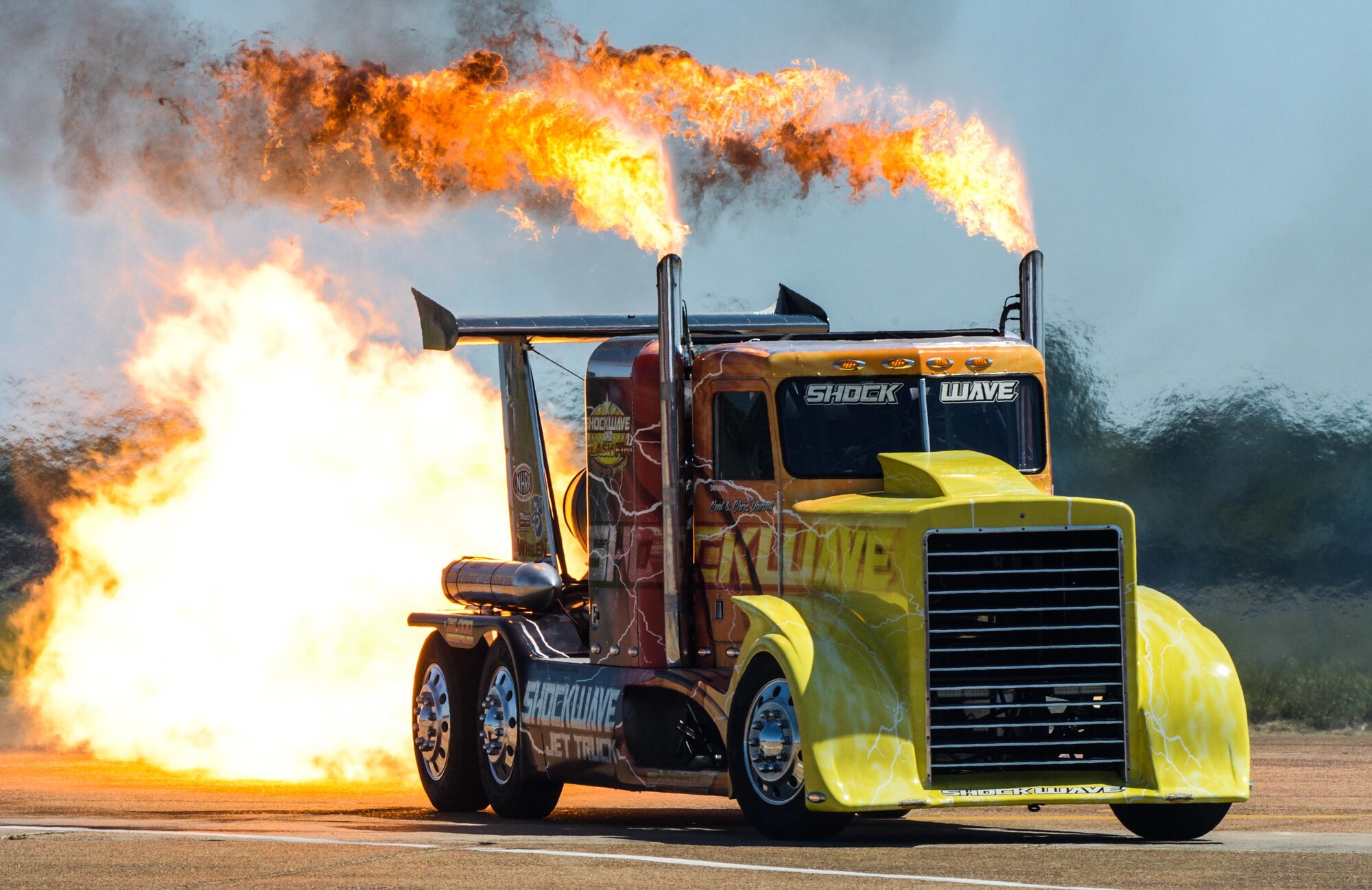 The Shockwave Jet Truck races down the flightline during the 2017 Barksdale Air Force Base Airshow, May 6. Shockwave is the Guinness Book world record holder for the fastest jet truck in the world at 376 mph. (U.S. Air Force photo/Airman 1st Class Curt Beach)