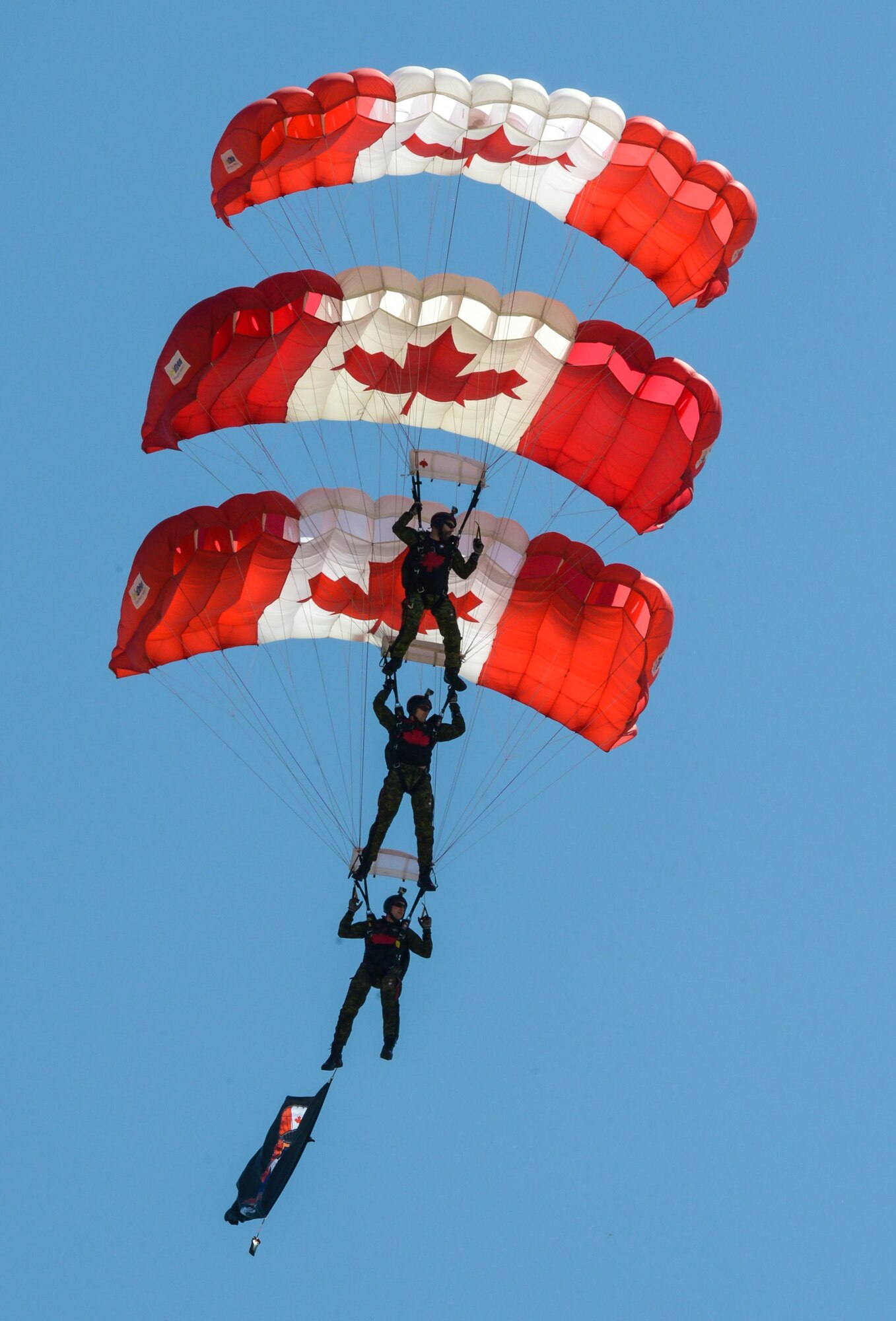 The Skyhawks, the Canadian armed forces parachute team, perform for spectators at the 2017 Barksdale Air Force Base Airshow, May 6. The Skyhawks have performed aerobatic stunts for more than 75 million spectators over 40 years. (U.S. Air Force photo/Senior Airman Curt Beach)