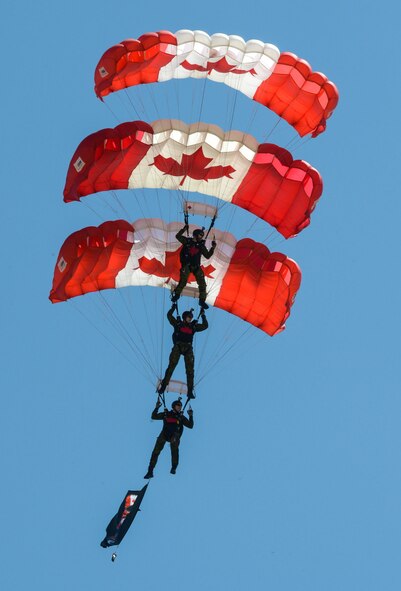 The Skyhawks, the Canadian armed forces parachute team, perform for spectators at the 2017 Barksdale Air Force Base Airshow, May 6. The Skyhawks have performed aerobatic stunts for more than 75 million spectators over 40 years. (U.S. Air Force photo/Senior Airman Curt Beach)