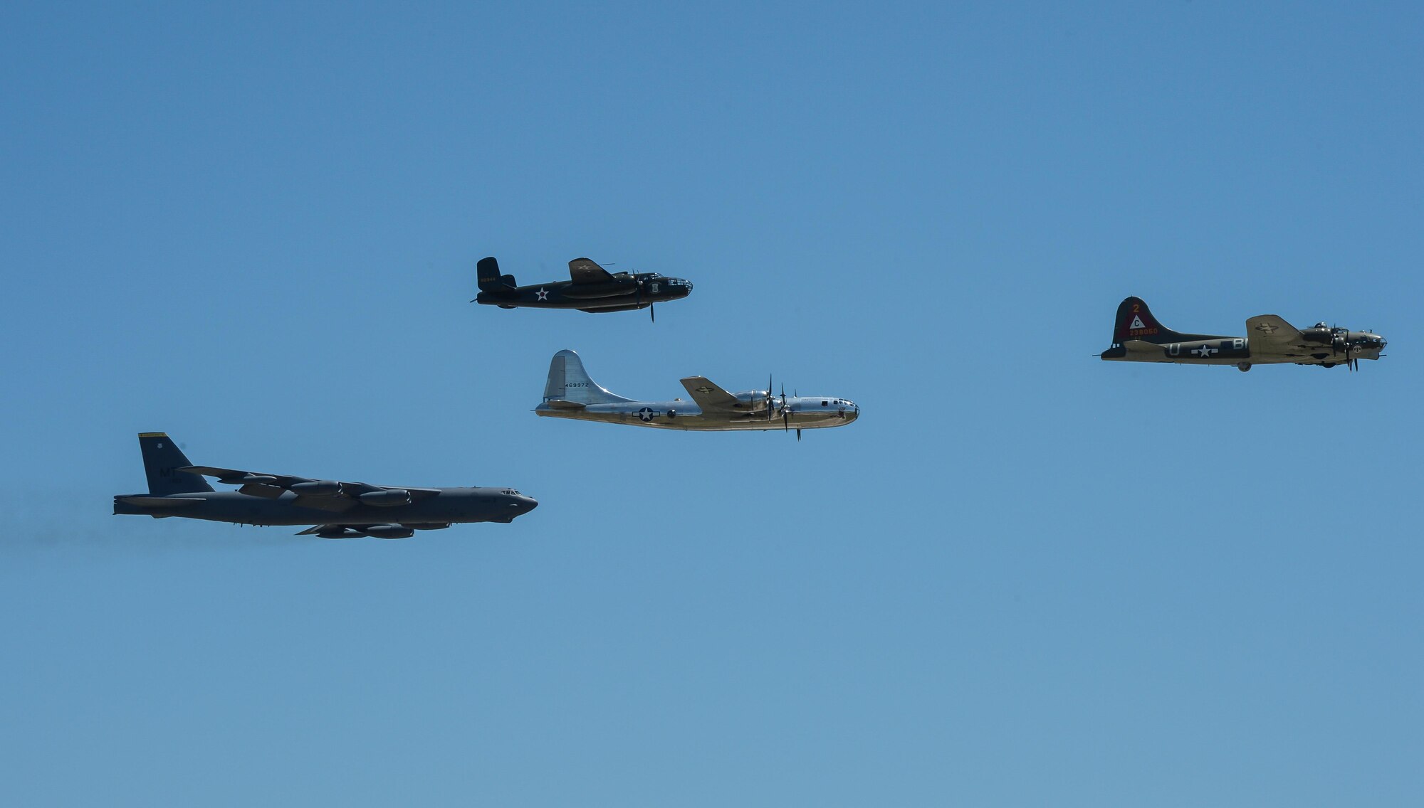 A B-52 Stratofortress, B-17 Flying Fortress, B-29 Superfortress and B-25 Mitchell perform a flyby at the 2017 Barksdale Air Force Base Airshow, May 6. This was the first time in history that all four of these bombers appeared in the same formation. (U.S. Air Force photo/Senior Airman Curt Beach)