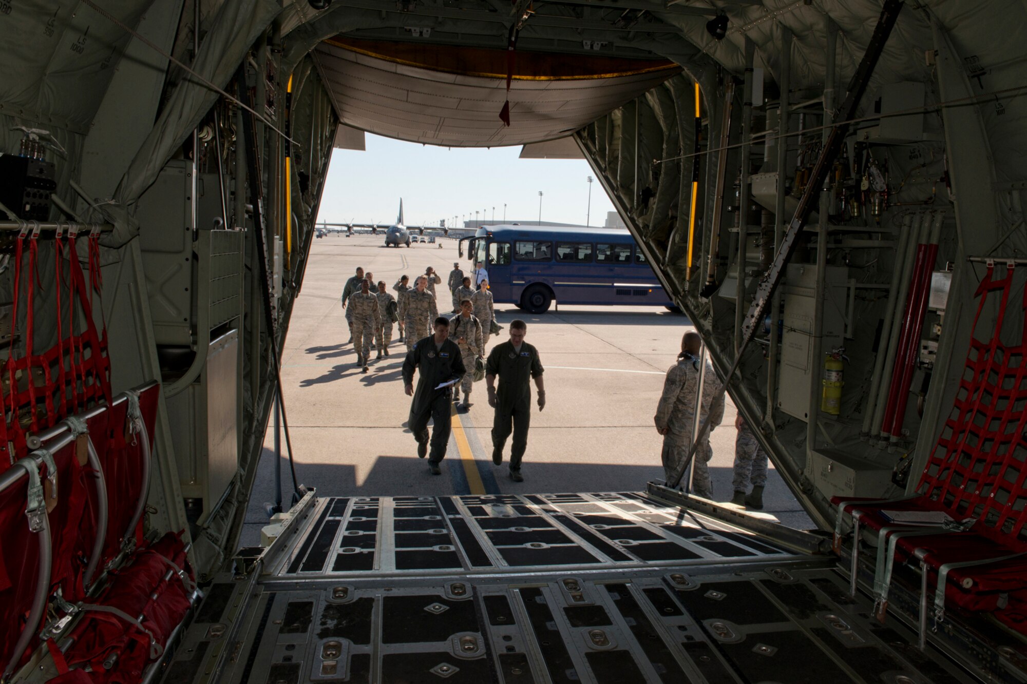 Twelve U.S. Air Force Reserve Airmen board a C-130J Super Hercules for an orientation flight hosted by the 913th Airlift Group May 6, 2017, at Little Rock Air Force Base, Ark. The flight, which was part of a two-ship training mission, gave the Airmen an opportunity to experience what happens during the airborne operations they support from the ground. (U.S. Air Force photo by Master Sgt. Jeff Walston/Released)