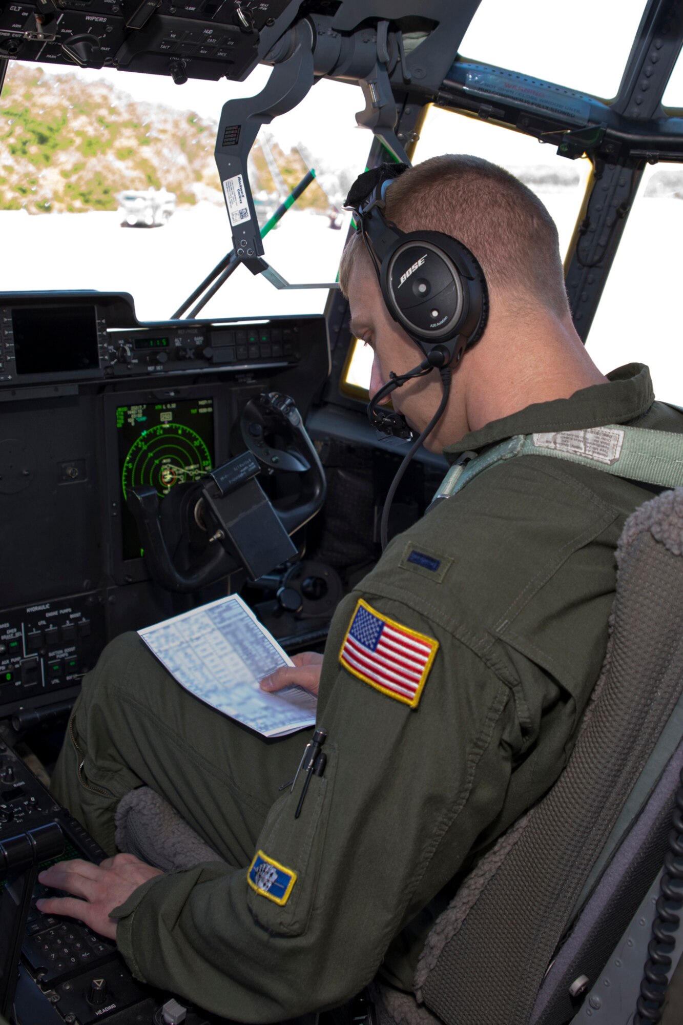 U.S. Air Force Reserve 1st Lt. Tony Ciaccio, pilot, 327th Airlift Squadron, performs preflight checklists in a C-130J Super Hercules before taking off from Little Rock Air Force Base, Ark., May 6, 2017. Ciaccio was part of the two-ship training mission and his aircraft carried 12 Airmen on an orientation flight giving them an opportunity to observe what aircrews do during airborne operations. (U.S. Air Force photo by Master Sgt. Jeff Walston/Released)