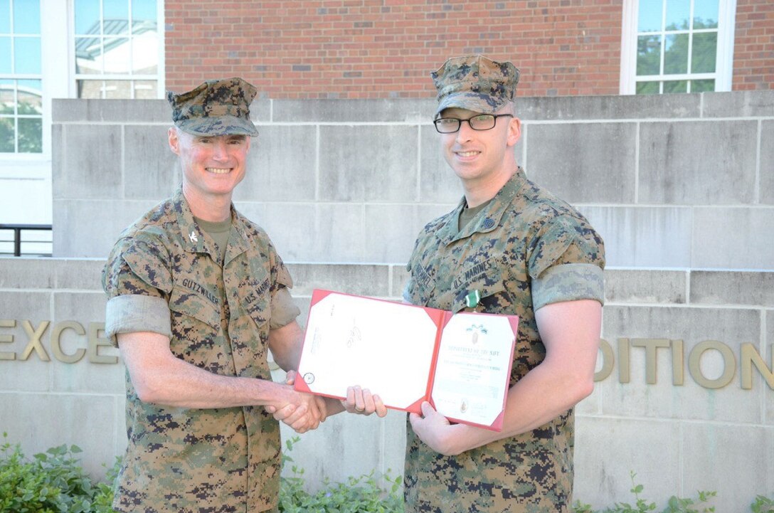 Staff Sgt. Andrew Kremmel received the Navy and Marine Corps Commendation Medal for performing CPR on a member of the NGA workforce who went into cardiac arrest while exercising at the NGA gymnasium.