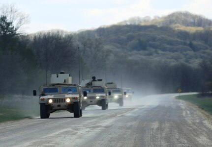 Service members at Fort McCoy for training in the 86th Training Division’s Warrior Exercise 86-17-02 drive tactical vehicles in a convoy on South Post during exercise operations May 4, 2017, at Fort McCoy, Wis. Nearly 6,000 Soldiers participated in the Warrior Exercise that focuses on realistic and austere operational environments. The exercise is aimed at testing and developing leaders at every echelon. One of the key objectives for the 2017 Warrior Exercise was to enable units at the platoon level to succeed in a tactical environment when faced with the stressors of combat. (U.S. Army Photo by Scott T. Sturkol, Public Affairs Office, Fort McCoy, Wis.)