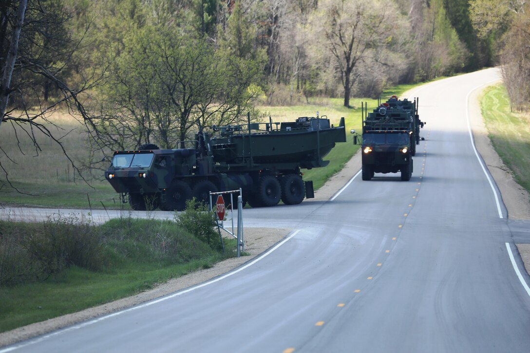 Service members at Fort McCoy for training in the 86th Training Division’s Warrior Exercise 86-17-02 drive tactical vehicles in a convoy on South Post during exercise operations May 4, 2017, at Fort McCoy, Wis. Nearly 6,000 Soldiers participated in the Warrior Exercise that focuses on realistic and austere operational environments. The exercise is aimed at testing and developing leaders at every echelon. One of the key objectives for the 2017 Warrior Exercise was to enable units at the platoon level to succeed in a tactical environment when faced with the stressors of combat. (U.S. Army Photo by Scott T. Sturkol, Public Affairs Office, Fort McCoy, Wis.)