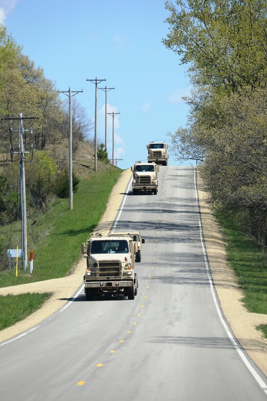 Service members at Fort McCoy for training in the 86th Training Division’s Warrior Exercise 86-17-02 drive tactical vehicles in a convoy on South Post during exercise operations May 4, 2017, at Fort McCoy, Wis. Nearly 6,000 Soldiers participated in the Warrior Exercise that focuses on realistic and austere operational environments. The exercise is aimed at testing and developing leaders at every echelon. One of the key objectives for the 2017 Warrior Exercise was to enable units at the platoon level to succeed in a tactical environment when faced with the stressors of combat. (U.S. Army Photo by Scott T. Sturkol, Public Affairs Office, Fort McCoy, Wis.)