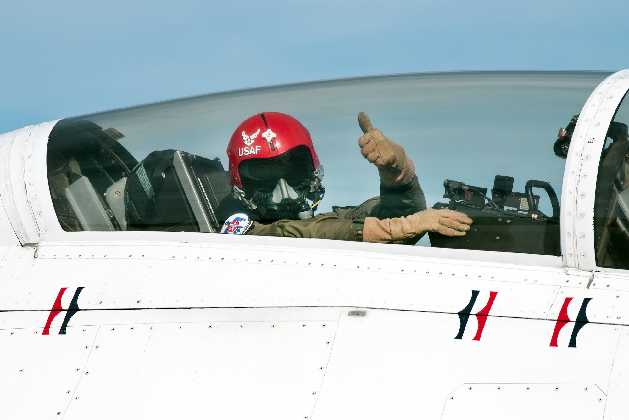 Former airline pilot, Chesley “Sully” Sullenberger III, gives a thumbs up before his flight with the United States Air Force Thunderbirds at Travis Air Force Base, Calif., May 4, 2017. Sullenberger is a 1973 Air Force Academy graduate and is best known for successfully landing a crippled airliner in the Hudson River saving the lives of 155 passengers. (U.S. Air Force photo by Louis Briscese)