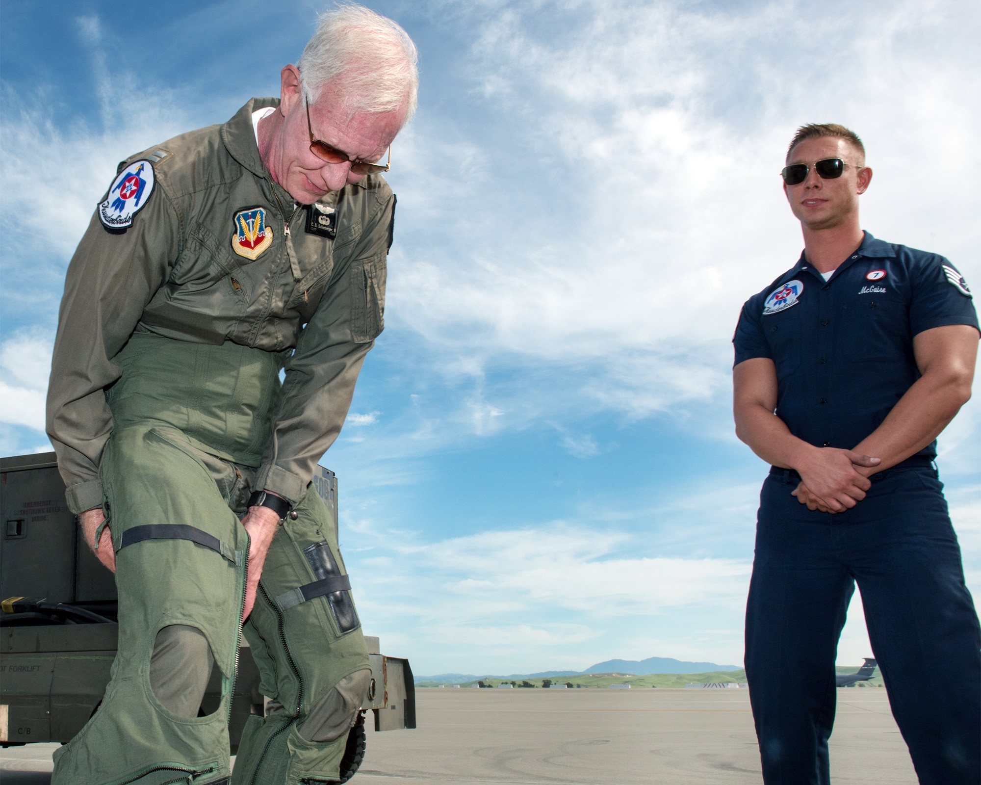 Former airline pilot, Chesley “Sully” Sullenberger III, puts on his G-suit before his flight with the United States Air Force Thunderbirds at Travis Air Force Base, Calif., May 4, 2017. Sullenberger is a 1973 Air Force Academy graduate and is best known for successfully landing a crippled airliner in the Hudson River saving the lives of 155 passengers. (U.S. Air Force photo by Louis Briscese)