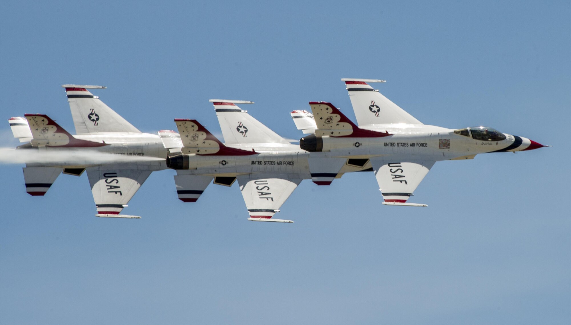 The United States Air Force Thunderbirds arrive at Travis Air Force Base, Calif., May 4, 2017. Shortly after arriving, the Thunderbirds flew with former airline pilot and Air Force Academy graduate Chesley "Sully" Sullenberger III. The Thunderbirds performed in the Wings Over Solano air show, the two-day event also featured skydiving by the U.S. Army Golden Knights parachute team, flyovers and static displays. (U.S. Air Force photo by Heide Couch)