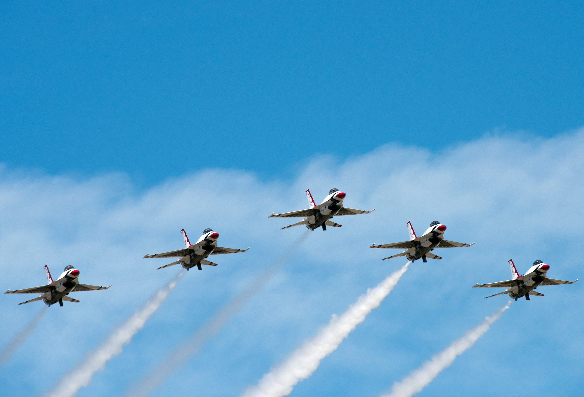 The United States Air Force Thunderbirds arrive at Travis Air Force Base, Calif., May 4, 2017. Shortly after arriving, the Thunderbirds flew with former airline pilot and Air Force Academy graduate Chesley "Sully" Sullenberger III. The Thunderbirds performed in the Wings Over Solano air show, the two-day event also featured skydiving by the U.S. Army Golden Knights parachute team, flyovers and static displays. (U.S. Air Force photo by Louis Briscese)