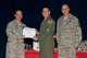 U.S. Air Force Reserve Col. Anthony Brusca, interim commander for the 913th Airlift Group, Tech Sgt. Derek R. Johnson, loadmaster, 327th Airlift Squadron and Chief Master Sgt. Paul Stewart, superintendent, 913 AG, pose for a photo during Commander’s Call May 7, 2017, at Little Rock Air Force Base, Ark. Gilbertson received his Community College of the Air Force Associate degree in Applied Science Aviation Operations. (U.S. Air Force photo by Master Sgt. Jeff Walston/Released)