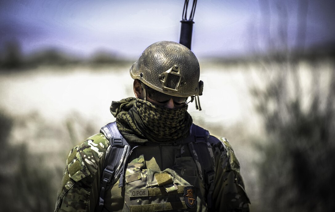 Senior Airman Michael Bemis, 99th Civil Engineer Squadron explosive ordnance disposal technician, searches for an improvised explosive device during a training scenario at Nellis Air Force Base, Nev., May 3, 2017. The scenarios prepare EOD technicians for the deployment environment. (U.S. Air Force photo by Senior Airman Kevin Tanenbaum/Released)