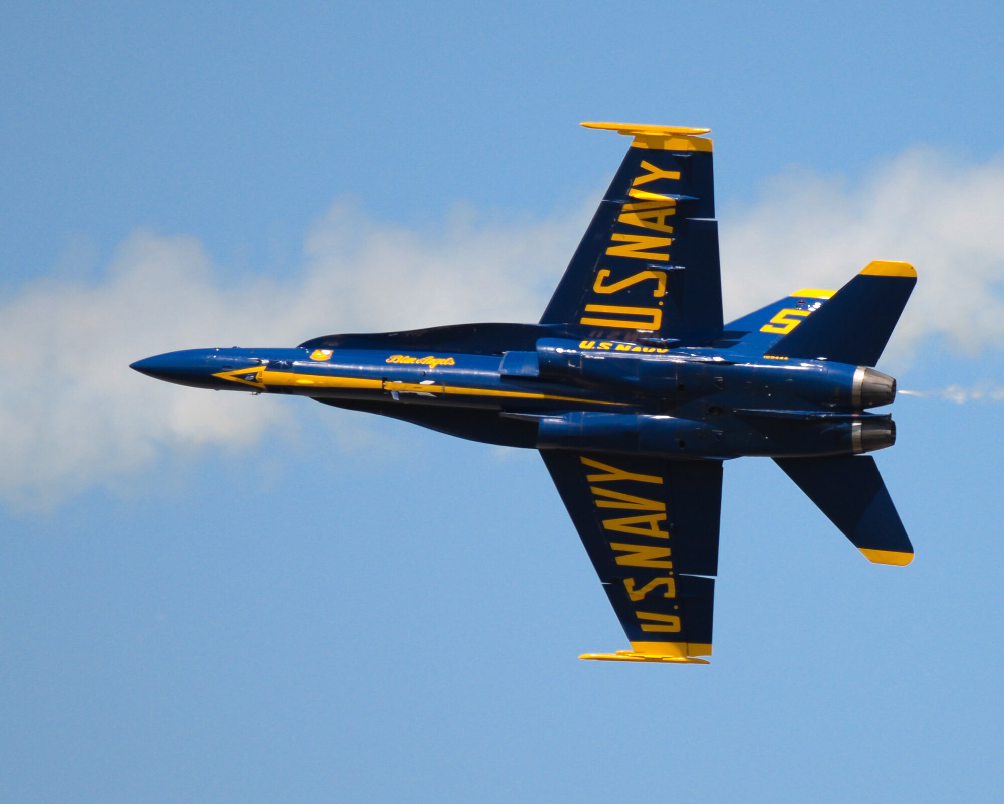 The U.S. Navy Flight Demonstration Team Blue Angels perform aerobatic maneuvers for spectators at the 2017 Barksdale Air Force Base Airshow, May 7. The mission of the Blue Angels is to showcase the pride and professionalism of the United States Navy and Marine Corps by inspiring a culture of excellence and service to country through flight demonstrations and community outreach. (U.S. Air Force photo/Staff Sgt. Benjamin Raughton)