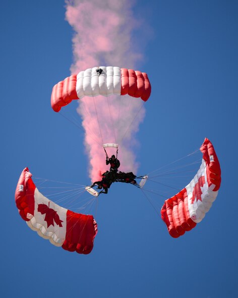 The Skyhawks, the Canadian armed forces parachute team, perform for spectators at the 2017 Barksdale Air Force Base Airshow, May 7. The Skyhawks have performed aerobatic stunts for more than 75 million spectators over 40 years. (U.S. Air Force photo/Staff Sgt. Benjamin Raughton)