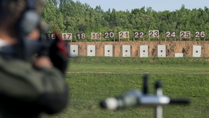 A Marine observes his target after firing during the Marine Corps Shooting Team Championships on Marine Corps Base Quantico, Va. May 4, 2017. Each year, the Marine Corps Shooting Team hosts the championship matches for medalists from each regional Marine Corps Markmanship Competition site to compete in individual and team matches. 